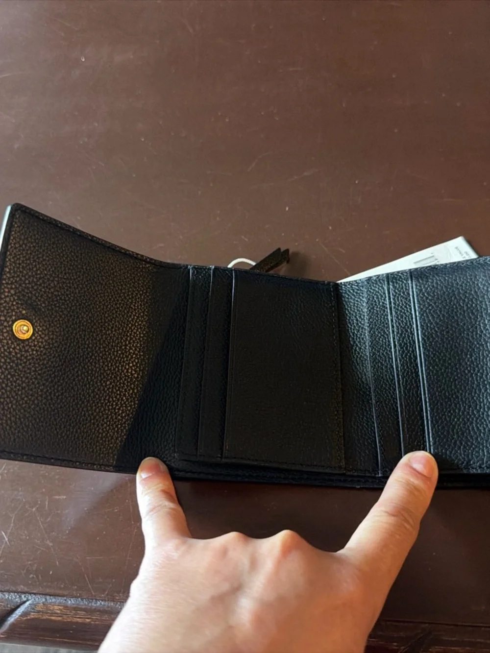 Tory Burch Britten Compact Wallet in black pebbled leather. - Picture 5 of 13